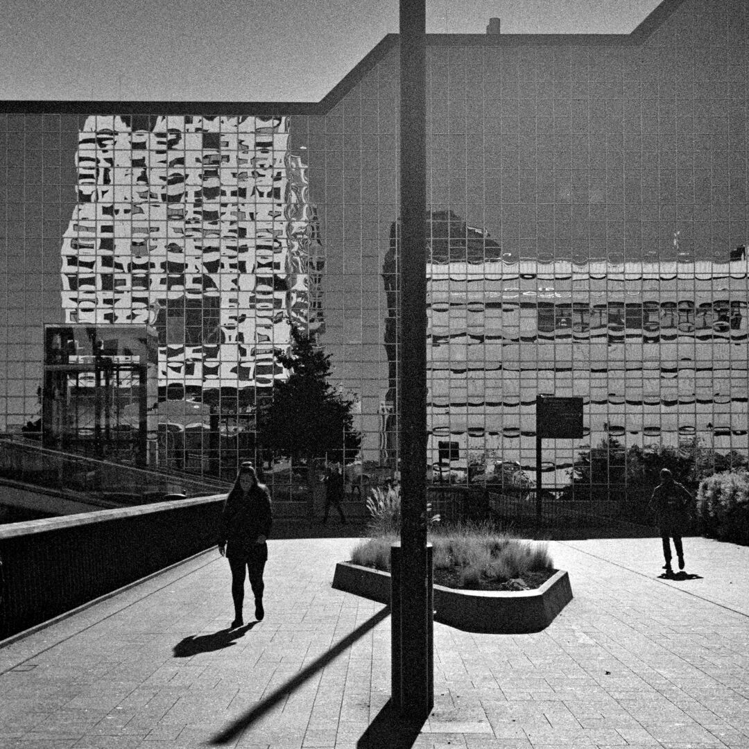 2024-10-09 street photography Utrecht Reflections in a glass building