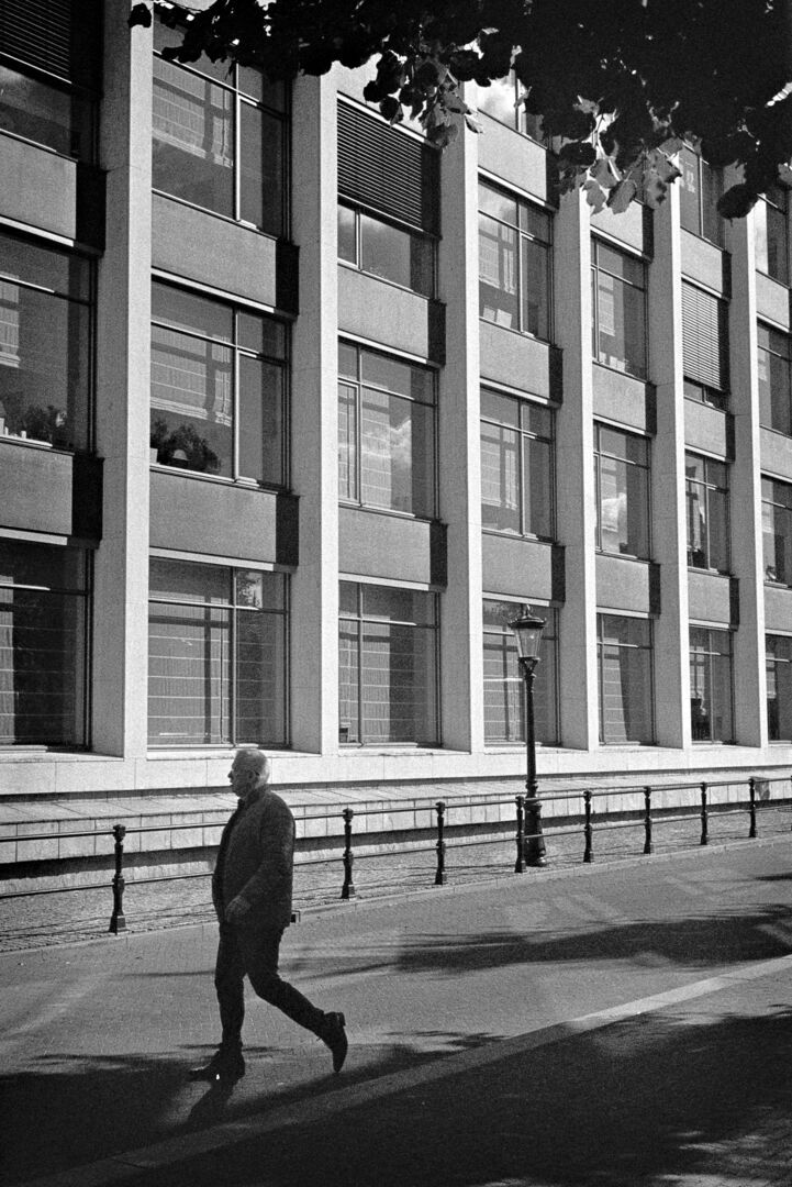 2024-10-09 street photography Utrecht Man in front of a building