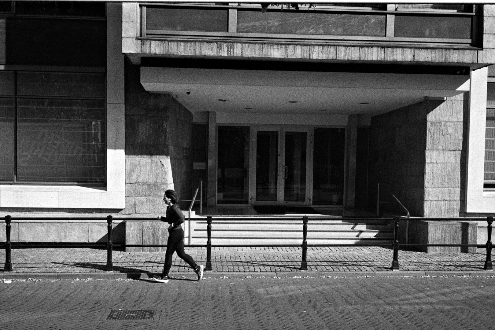 2024-10-09 street photography Utrecht Women in front of a building